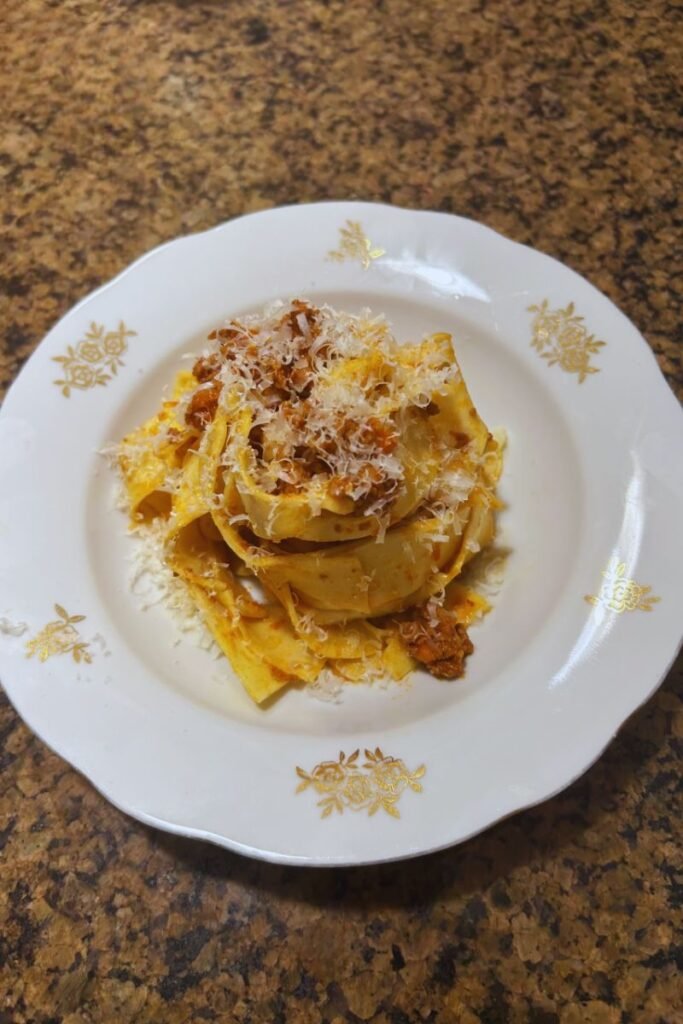 A delicious looking plate of pasta bolognese.