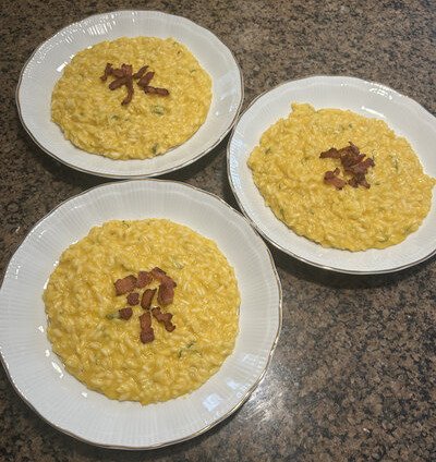 Three Butternut Squash Risotto dishes on a countertop.
