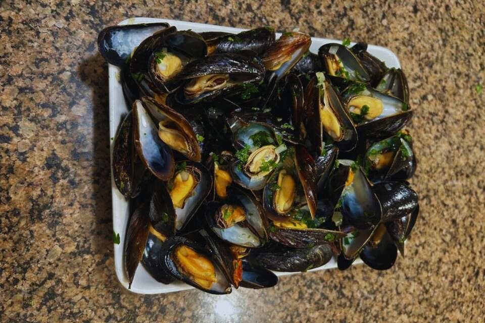 A platter of mussels that I just made resting on my kitchen counter.