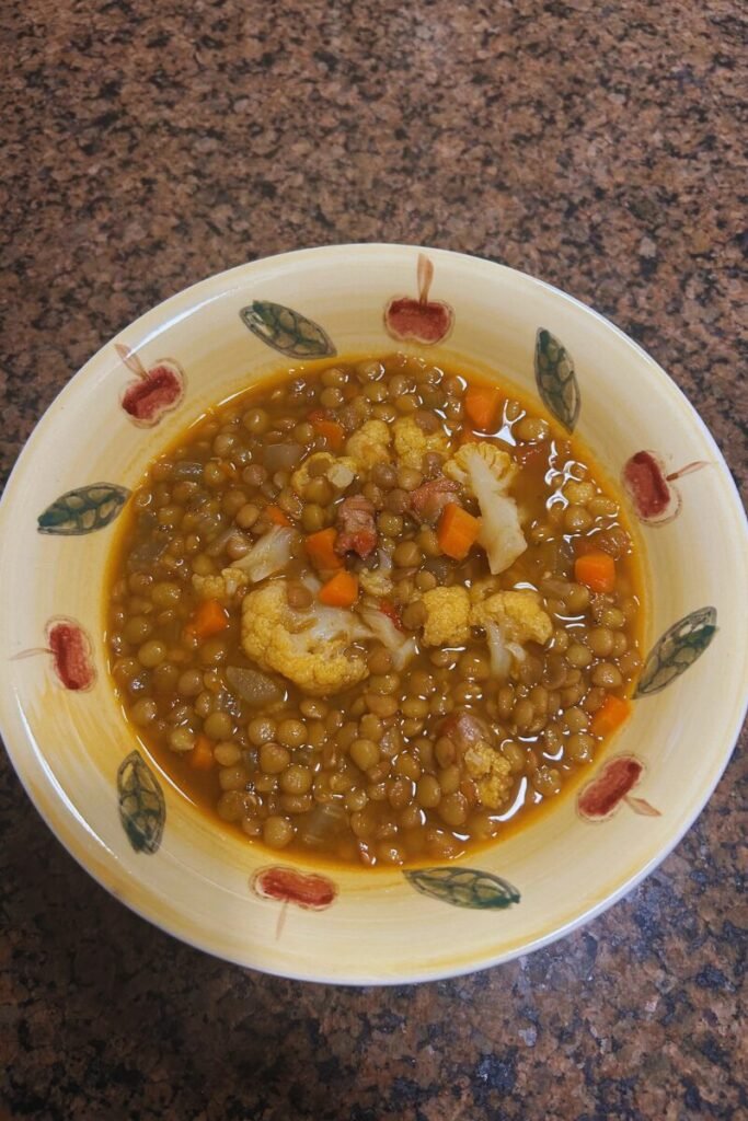 A plate of Lentil Soup With Cauliflower and Bacon.