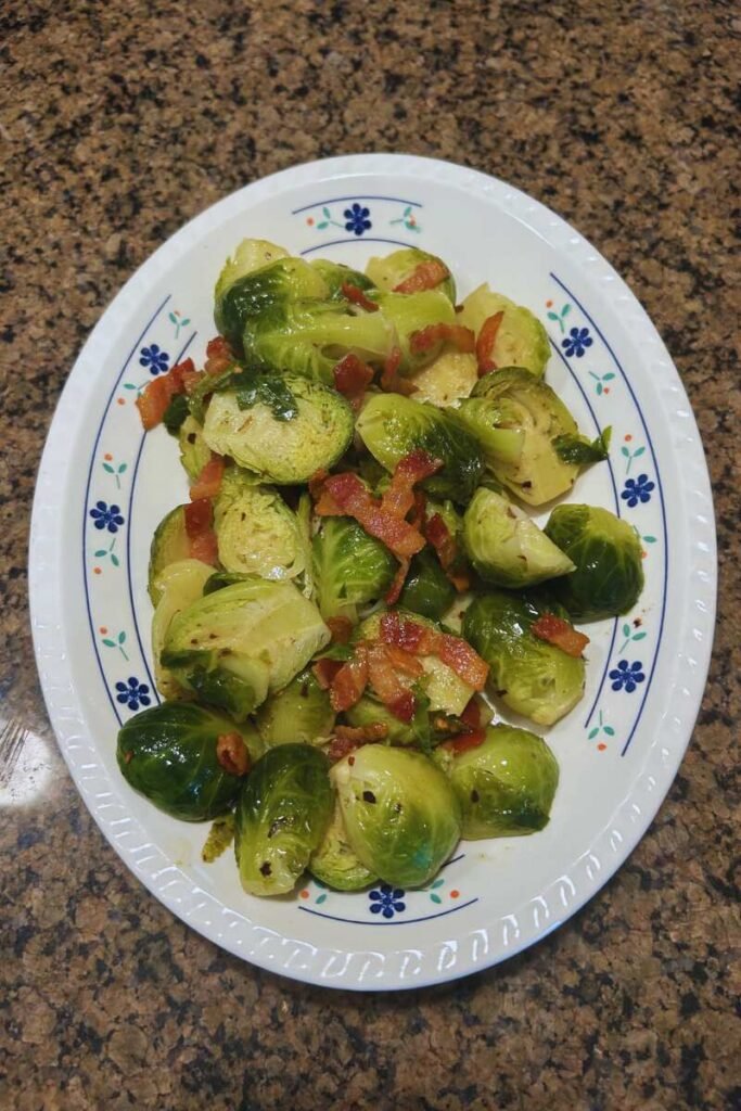 Pan-Seared Brussels Sprouts with Crispy Bacon, Garlic & Chili.