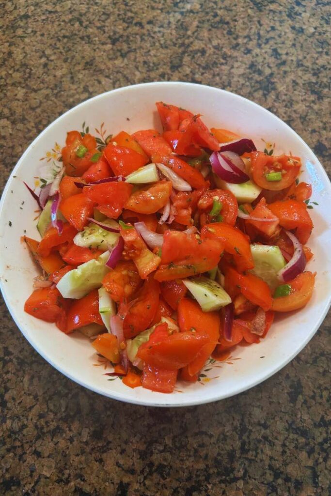 Simple Tomato Salad with Cucumber And Red Onion.