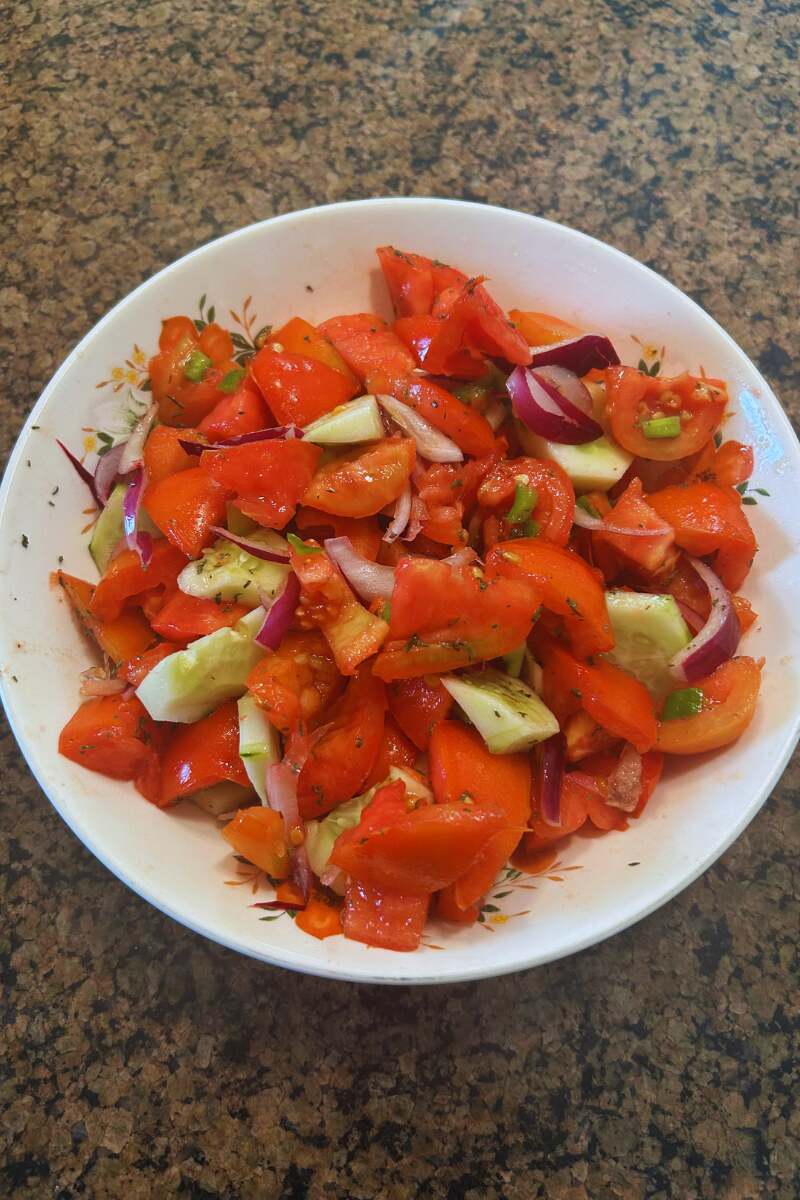 Simple Tomato Salad with Cucumber And Red Onion.